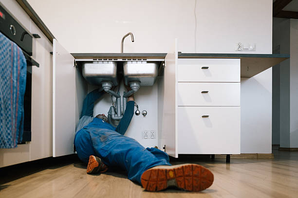 Professional Plumbing technician working in Kings Park, NY